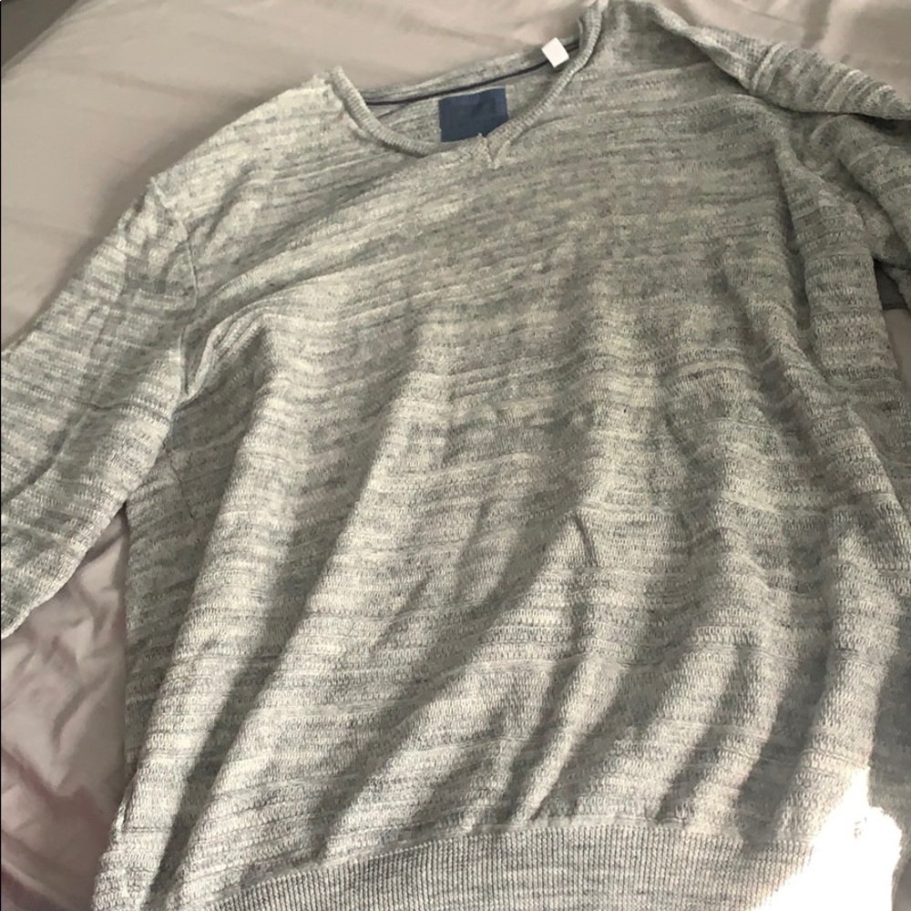 Men’s sweater- is a large but fits like a med